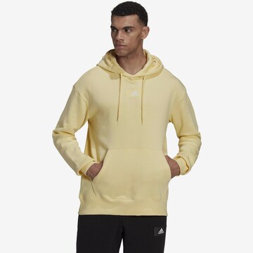 ADIDAS SPORTSWEAR - Sweatshirt de desporto 'Essentials Feelvivid  Fleece Drop Shoulder' em amarelo: frente