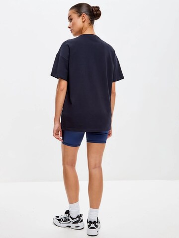 Cat e Lolette Shirt 'Sport cat with dumbbells'‌‌ in Blau