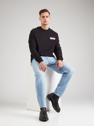 Tommy Jeans Tapered Τζιν 'ISAAC' σε μπλε