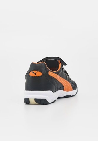 Chaussure de foot 'King' PUMA en noir : derrière