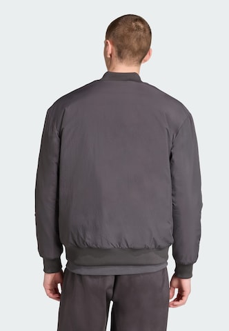 Veste fonctionnelle 'Manchester United Terrace Icons' ADIDAS ORIGINALS en noir