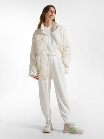 DEHA Slim fit Trousers in White: front