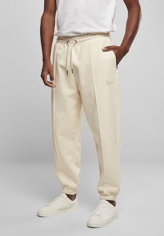 Karl Kani Tapered Hose in Beige: predná strana