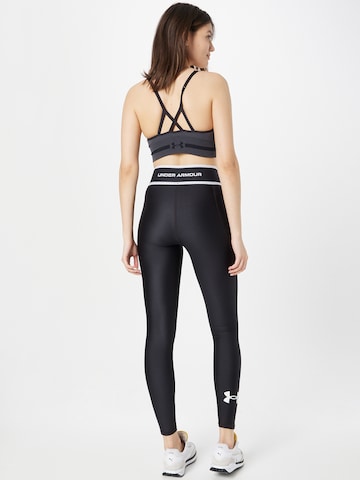 UNDER ARMOUR Skinny Sportovní kalhoty 'HeatGear' – černá