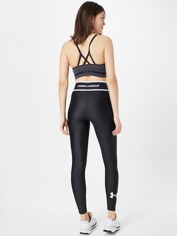 UNDER ARMOUR Skinny Παντελόνι φόρμας 'HeatGear' σε μαύρο