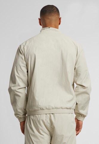 Karl Kani Between-season jacket 'Essential' in Beige
