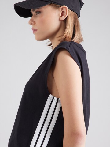 Top sportivo di ADIDAS SPORTSWEAR in nero