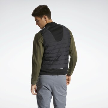 Reebok Sportbodywarmer 'DMX Training Hybrid' in Zwart