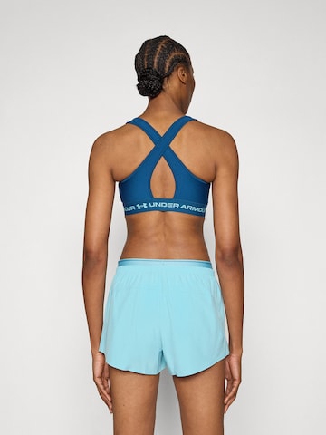 UNDER ARMOUR Bustier Biustonosz sportowy w kolorze niebieski