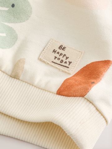 Set Next en beige