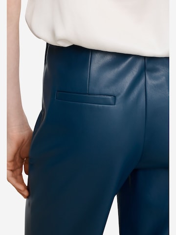 Flared Pantaloni di Adolfo Dominguez in blu