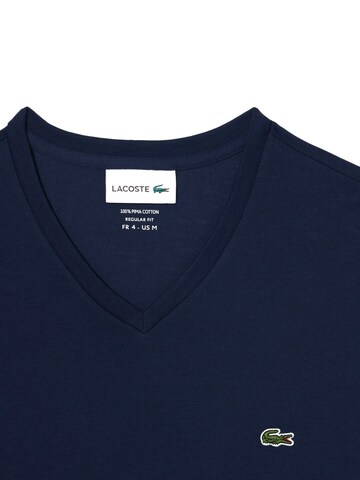 Maglietta di LACOSTE in blu