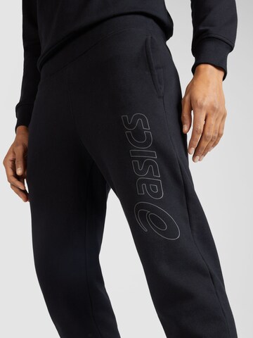 Effilé Pantalon de sport ASICS en noir