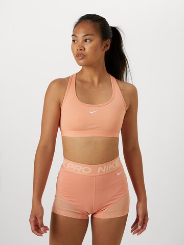 NIKE Bralette Sports bra in Orange: front