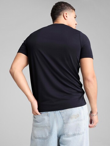 PUMA Performance shirt 'ESS' in Blue