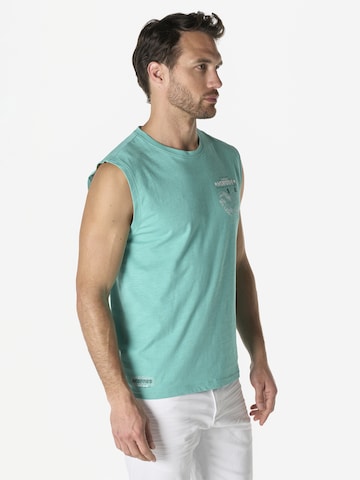 KOROSHI Paita värissä vihreä