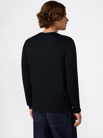 Maglietta di Champion Authentic Athletic Apparel in nero