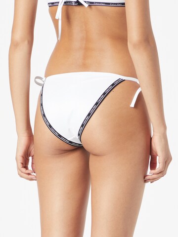 Calvin Klein Swimwear Bikinové nohavičky - biela