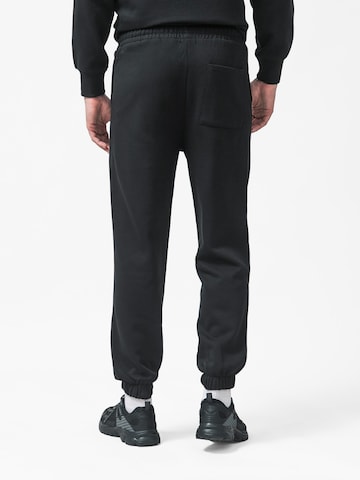 L'Arte Milano Tapered Hose‌‌‌ in Schwarz