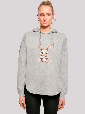 Sweat-shirt 'Niedlicher Osterhase mit Ei' F4NT4STIC en gris : devant