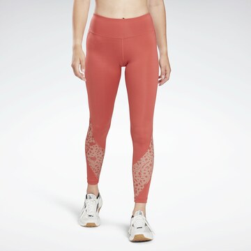 Skinny Pantalon de sport 'Modern Safari' Reebok en rouge : devant