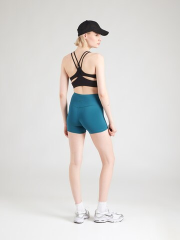 Skinny Pantaloni sport de la 4F pe verde