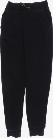 PEAK PERFORMANCE Pants in XS in Black: front