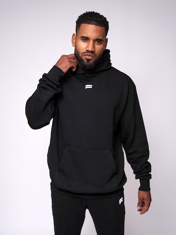 Pull-over 'Essential Oversized Hoodie' Fortex Fitness en noir