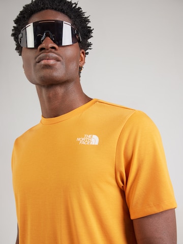 THE NORTH FACE - Camiseta funcional 'BITMAP' en naranja