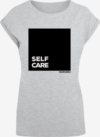 F4NT4STIC Shirt 'Self Care' in Grijs: voorkant