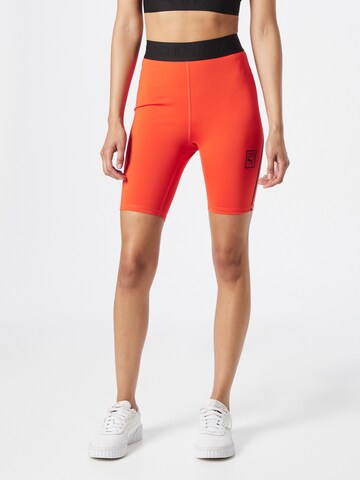 PUMA Skinny Workout Pants in Red: front