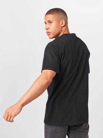Mister Tee Shirt 'Kindness No Weakness' in Schwarz