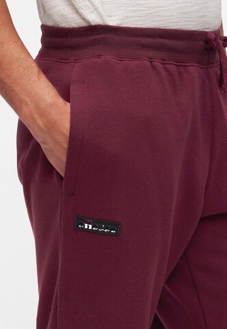 ELLESSE Конический (Tapered) Штаны 'Verazo' в Красный