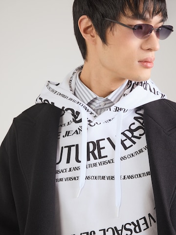 Versace Jeans Couture Bluzka sportowa '80GAI3H0' w kolorze biały