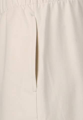 Athlecia Regular Workout Pants in Beige