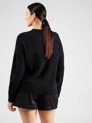 Pullover 'CARDaisy' di ONLY Carmakoma in nero