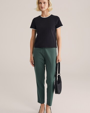 Slimfit Pantaloni con piega frontale di WE Fashion in verde