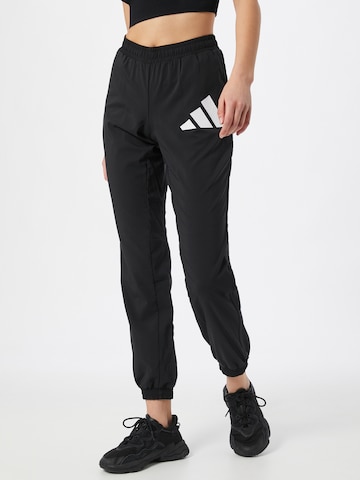 ADIDAS PERFORMANCE Tapered Workout Pants in Black: front