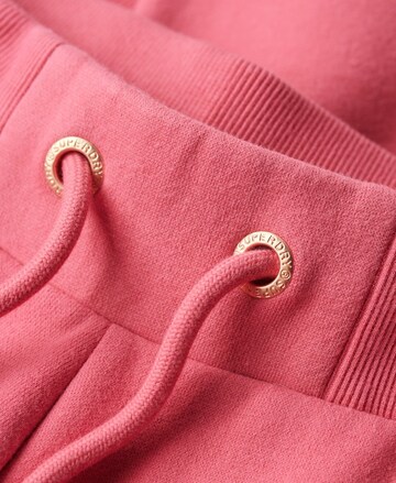 Superdry Tapered Broek 'Essential' in Roze