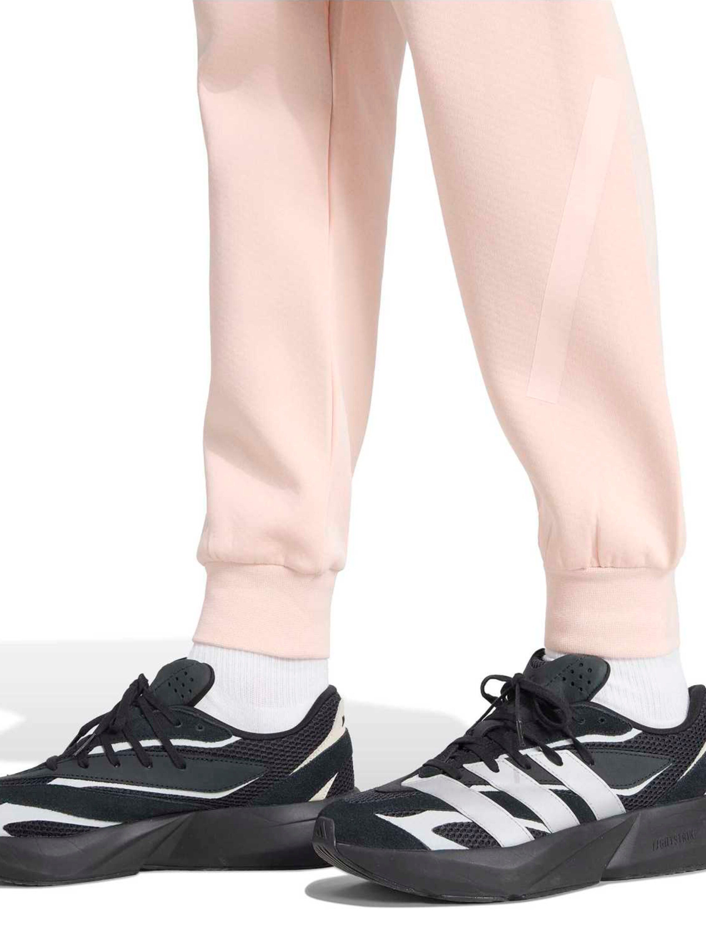 ADIDAS SPORTSWEAR Zwężany krój Spodnie sportowe 'Z.N.E.' w kolorze różowy