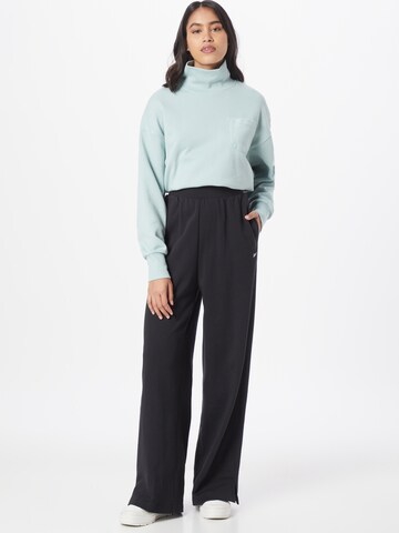 Reebok Wide leg Broek in Zwart