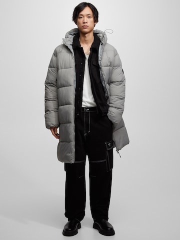 Pull&Bear Winter Jacket in Grey: front