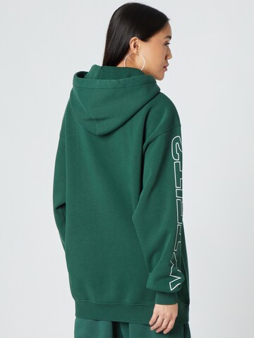 ABOUT YOU x Dardan - Sudadera 'Elia' en verde