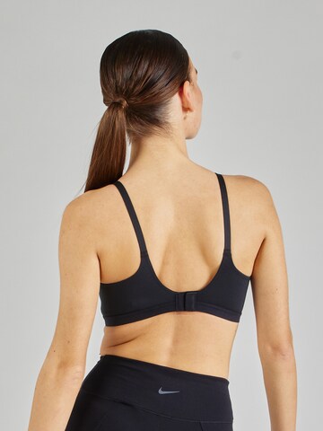 NIKE Bustier Urheilurintaliivit 'ALATE' värissä musta