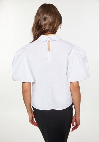 Camicia da donna di faina in bianco