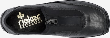 Rieker Slipper in Schwarz