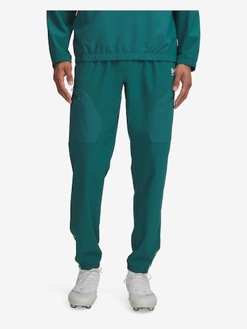 UNDER ARMOUR Workout Pants 'Challenger' in Green: front
