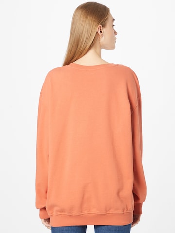 ABOUT YOU Limited Sweatshirt 'Kai' by Jannik Stutzenberger' i orange