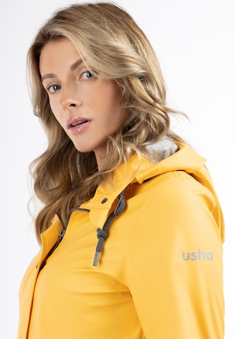 Manteau fonctionnel Usha en jaune