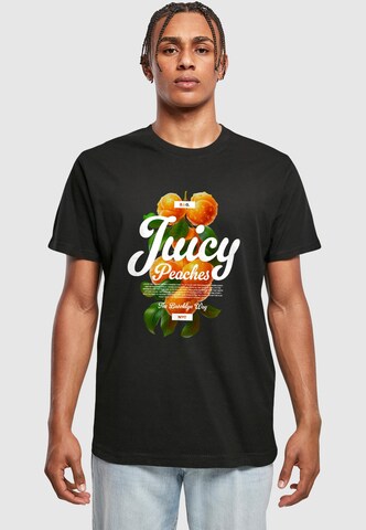 T-Shirt 'Delicious Peaches' Mister Tee en noir : devant